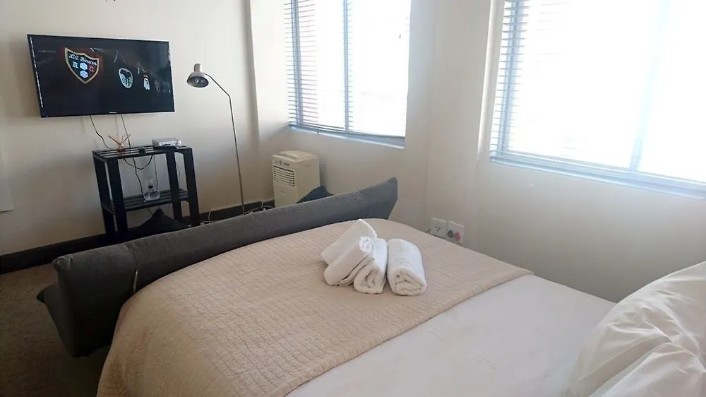 Urban Oasis At The Square Apartment
